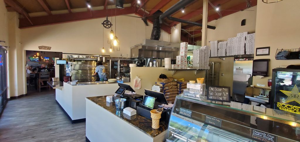 Tenant Improvement Pizza PLace in Munds Park serving and Ice cream counter General Contractor shows Tenant Improvement Register and Ice Cream Areas